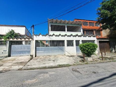 Foto 1 do(a) Casa de 4 quartos à venda em Jardim América, Rio de Janeiro