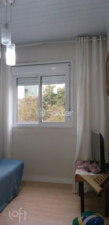 Foto 14 do(a) Casa em Condomínio de 2 quartos à venda em Restinga, Porto Alegre