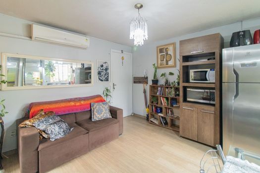 Foto 2 do(a) Flat de 2 quartos à venda em Vila Nova, Porto Alegre