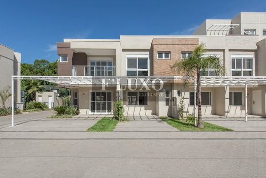 Foto 2 do(a) Casa em Condomínio de 4 quartos à venda em Vila Nova, Porto Alegre