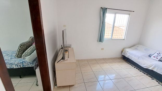 Foto 6 do(a) Casa de 2 quartos à venda em Parque São Vicente, São Vicente