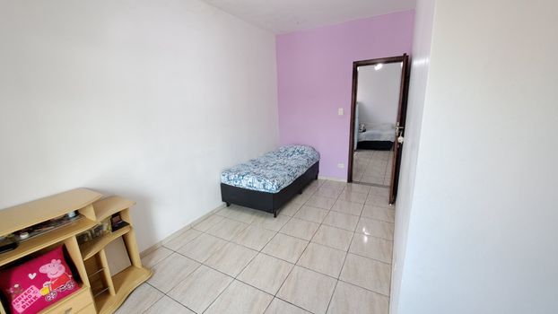 Foto 17 do(a) Casa de 2 quartos à venda em Parque São Vicente, São Vicente