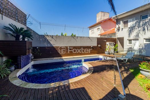 Foto 7 do(a) Casa de 5 quartos à venda em Chácara das Pedras, Porto Alegre