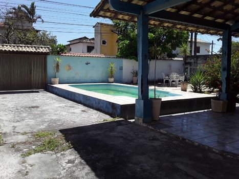 Foto 1 do(a) Casa de 6 quartos à venda em Extensão do Bosque, Rio das Ostras