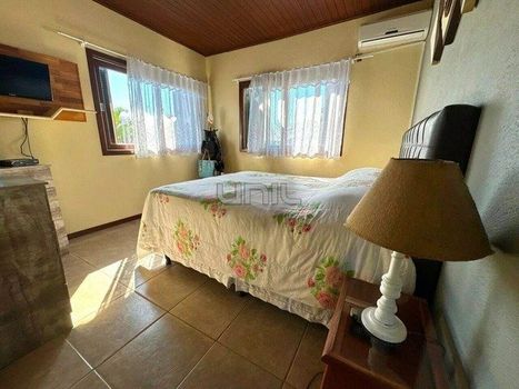 Foto 9 do(a) Casa em Condomínio de 5 quartos à venda em Ponta das Canas, Florianópolis