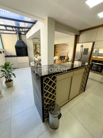 Foto 9 do(a) Casa em Condomínio de 4 quartos à venda em Vila Conceição, Porto Alegre