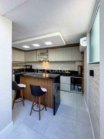 Foto 13 do(a) Casa em Condomínio de 4 quartos à venda em Vila Conceição, Porto Alegre