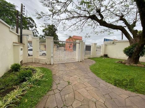 Foto 2 do(a) Casa em Condomínio de 5 quartos à venda em Jardim Floresta, Porto Alegre