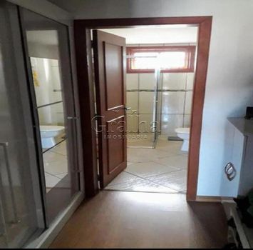 Foto 4 do(a) Casa de 3 quartos à venda em Jardim Botânico, Porto Alegre