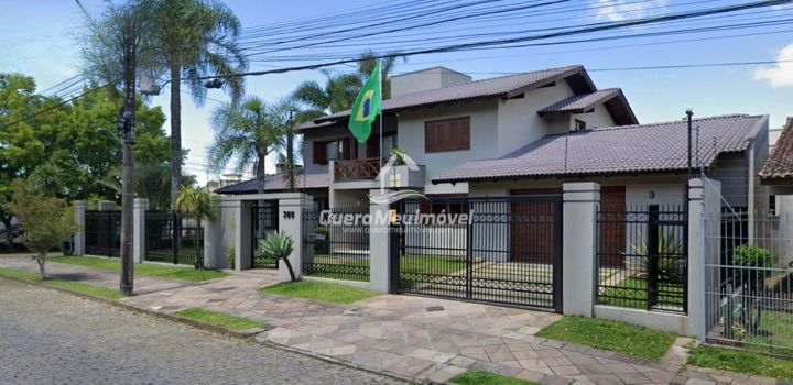 Foto 1 do(a) Casa de 4 quartos à venda em Cinqüentenário, Caxias do Sul