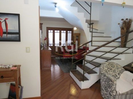 Foto 6 do(a) Casa em Condomínio de 3 quartos à venda em Santo Antônio, Porto Alegre