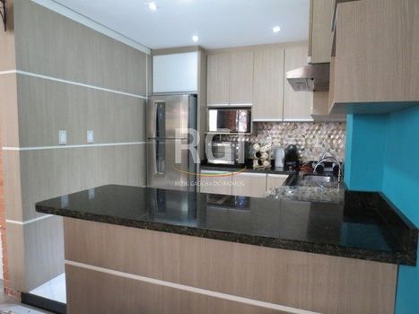 Foto 14 do(a) Casa em Condomínio de 3 quartos à venda em Santo Antônio, Porto Alegre