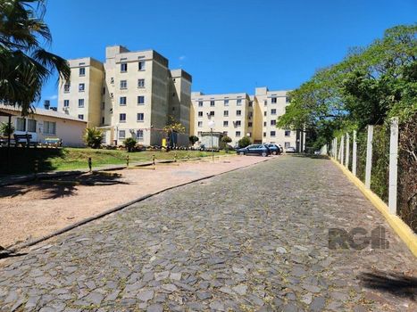 Foto 2 do(a) Flat de 2 quartos à venda em Vila Nova, Porto Alegre