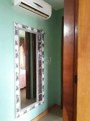 Foto 5 do(a) Flat de 2 quartos à venda em Vila Nova, Porto Alegre