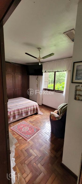 Foto 3 do(a) Casa de 3 quartos à venda em Sítio Ipiranga, Cachoeirinha