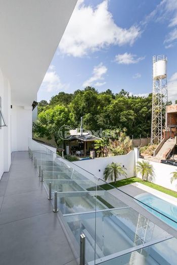 Foto 32 do(a) Casa em Condomínio de 3 quartos à venda em Hípica, Porto Alegre