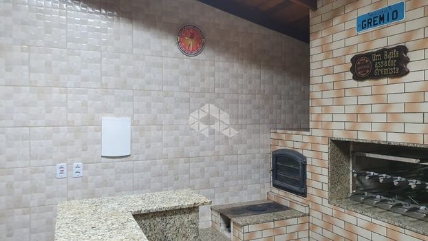 Foto 31 do(a) Casa de 3 quartos à venda em Guarujá, Porto Alegre