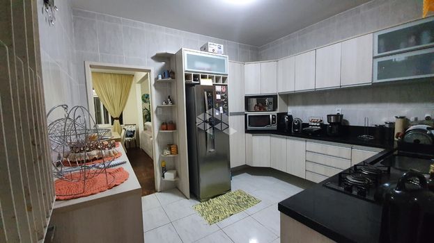 Foto 4 do(a) Casa de 3 quartos à venda em Guarujá, Porto Alegre