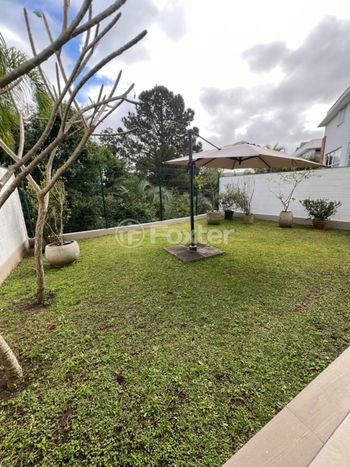 Foto 13 do(a) Casa em Condomínio de 4 quartos à venda em Lomba do Pinheiro, Porto Alegre
