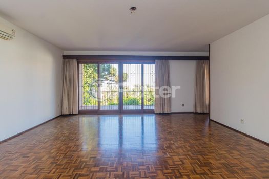 Foto 2 do(a) Apartamento de 3 quartos à venda em Auxiliadora, Porto Alegre