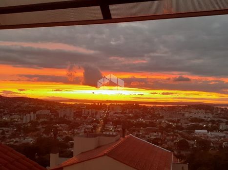 Foto 2 do(a) Casa em Condomínio de 4 quartos à venda em Nonoai, Porto Alegre