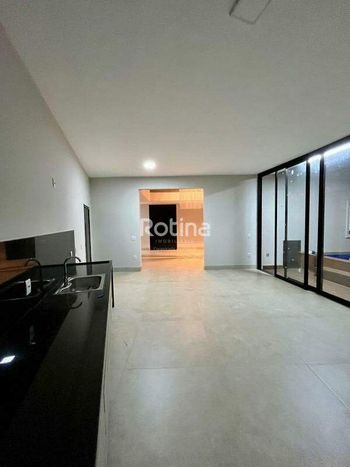 Foto 7 do(a) Casa em Condomínio de 4 quartos à venda em Aclimação, Uberlândia