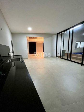 Foto 8 do(a) Casa em Condomínio de 4 quartos à venda em Aclimação, Uberlândia