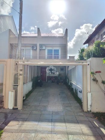 Foto 2 do(a) Casa de 3 quartos à venda em Guarujá, Porto Alegre