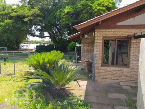 Foto 8 do(a) Casa de 4 quartos à venda em Arquipélago, Porto Alegre