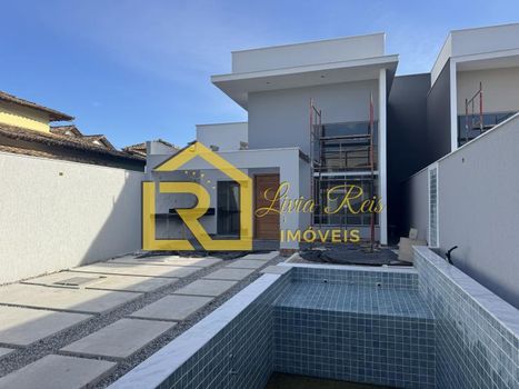Foto 1 do(a) Casa de 4 quartos à venda em Jardim Mariléa, Rio das Ostras
