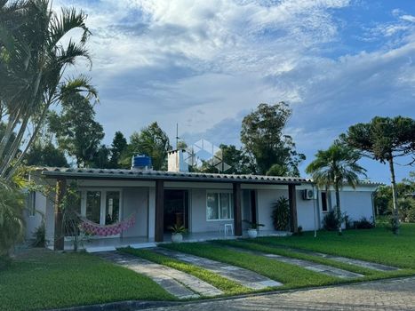 Foto 1 do(a) Casa em Condomínio de 4 quartos à venda em null, Osório