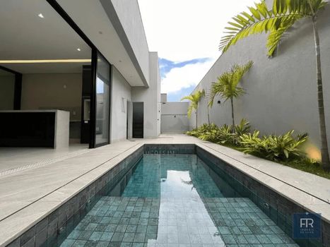 Foto 2 do(a) Casa em Condomínio de 3 quartos à venda em Aclimação, Uberlândia
