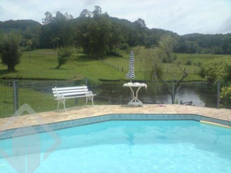 Foto 1 do(a) Fazenda / Sítio / Chácara de 4 quartos à venda em Santo Antônio, Porto Alegre
