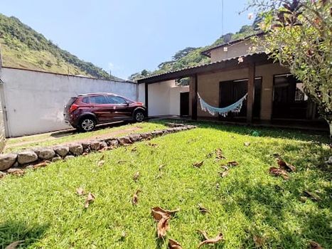 Foto 1 do(a) Casa de 4 quartos à venda em Massaguaçu, Caraguatatuba