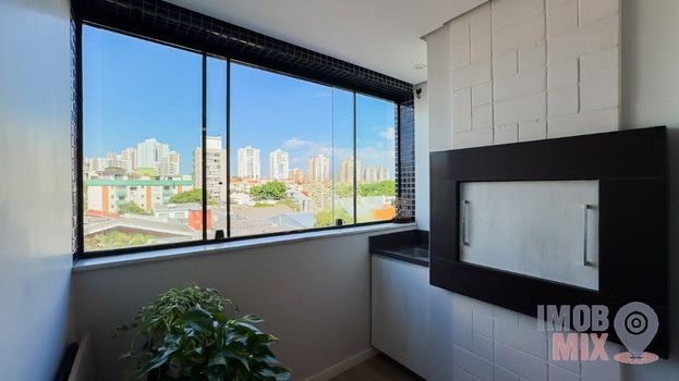 Foto 6 do(a) Apartamento de 2 quartos à venda em Passo da Areia, Porto Alegre